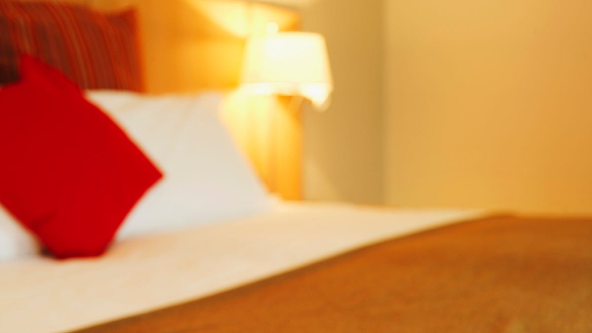 Hotel housekeepers may bleach the bathroom and dust the nightstand, but they rarely clean the TV remote - or the bedspread.