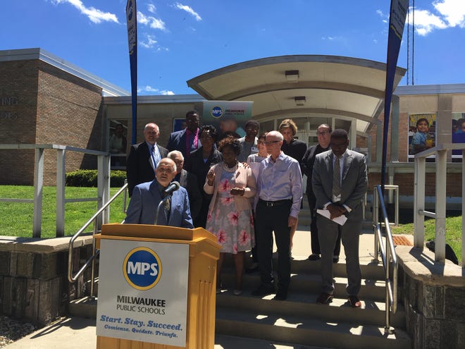 Milwaukee Public Schools President Larry Miller prepares to speak at a news conference outside MPS central offices last week. Miller, who appeared with several MPS board members and Superintendent Keith Posley (far right), criticized the Republican plan to invest an additional $500 million in education over the next two years, far less than the $1.4 billion proposed by Democratic Gov. Tony Evers.