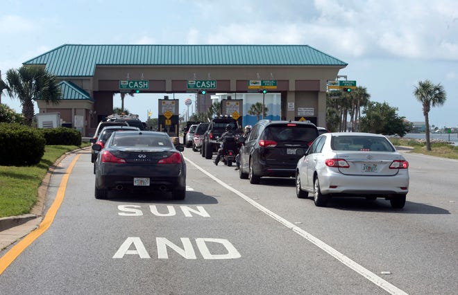 On Thursday, May 23, 2019, Motorists driving to Pensacola Beach and using cash to pay the bridge toll can now use the two left lanes. The Sun Pass only lanes are relocated to the far right at the Bob Sikes toll plaza.