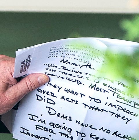 President Donald J. Trump holds his notes before...