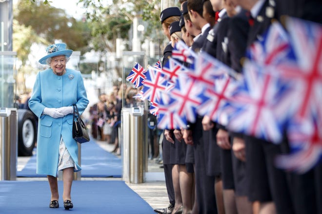 Queen Elizabeth II visits the headquarters of British Airways at Heathrow, on May 23, 2019, to mark the airline's centenary year.