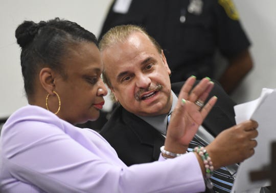 Robert Carmack speaks with his attorney Lillian Diallo Friday during his preliminary examination.