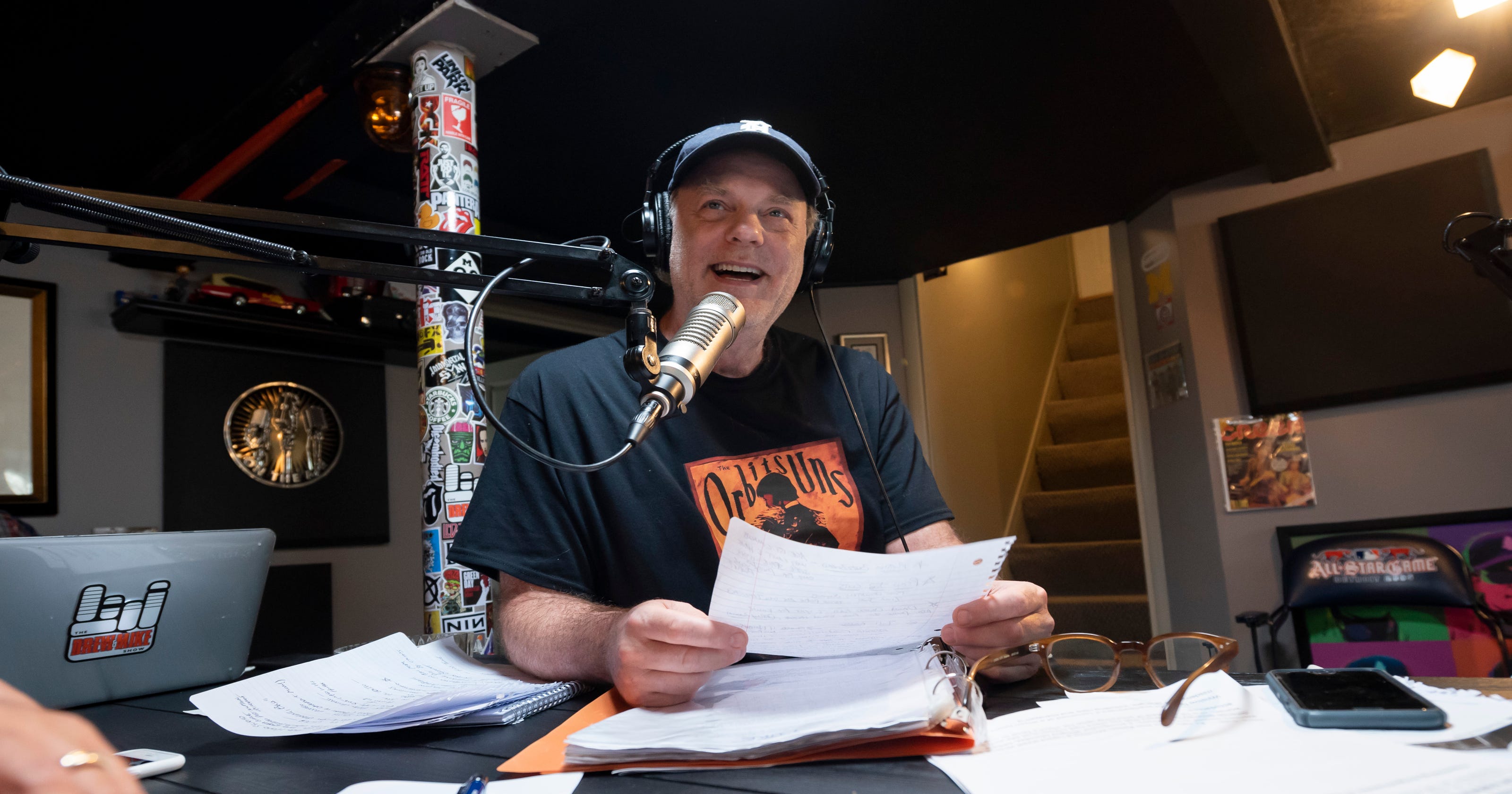 Drew Lane builds podcast miniempire in basement