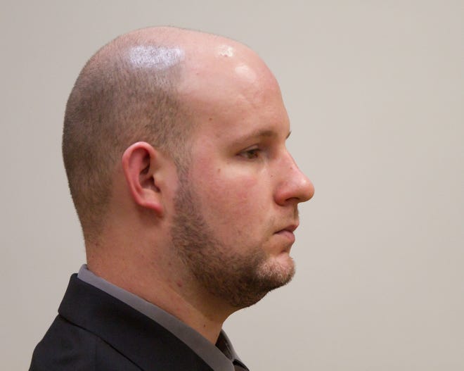Justin Bailey listens to his attorney Heather Nalley during a criminal sexual conduct motion hearing Thursday, May 23, 2019.