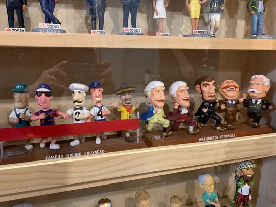 The racing sausages and racing presidents from the Brewers and Nationals are on display at the National Bobblehead Hall of Fame and Museum.