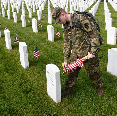 Cpl. Matthew Munie, of Jackson, Mich., and a...