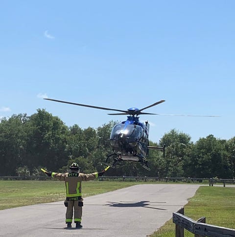 First Flight helicopter arrives at Fay Lake...