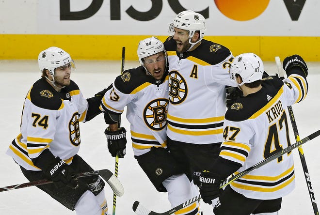 Patrice Bergeron, second from right, can still remember the instant euphoria and accompanying adoration from across New England that came after the Bruins outlasted the Vancouver Canucks in seven games to win the Cup in 2011.