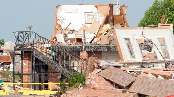 A building is destroyed after a large tornado hit...
