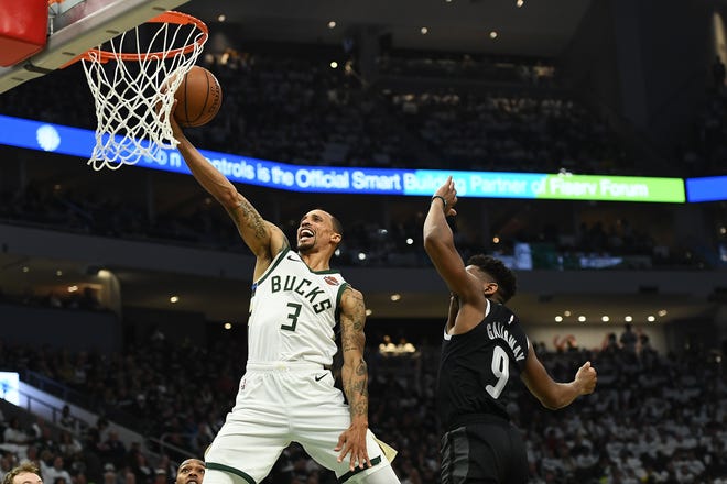 Bucks guard George Hill drives to the basket against Langston Galloway of the Pistons during a playoff game at Fiserv Forum on April 14. Hill will likely be a free agent this summer as the Bucks can save $17 million and only pay him $1 million by releasing him.