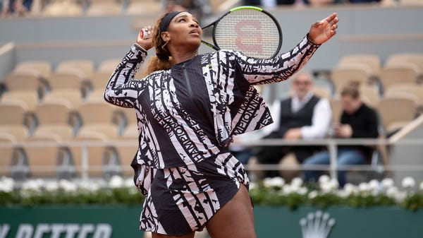 May 27: Serena Williams sports a warmup jacket...