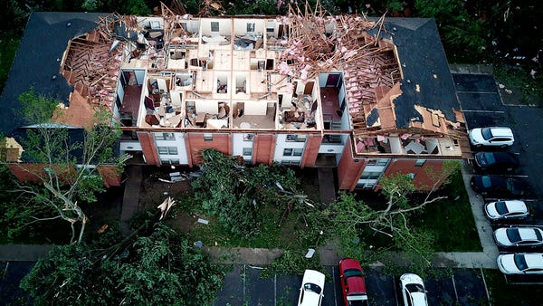 This aerial photo shows tornado damage at the...