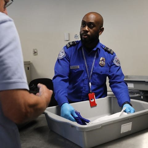 A Transportation Security Administration worker...
