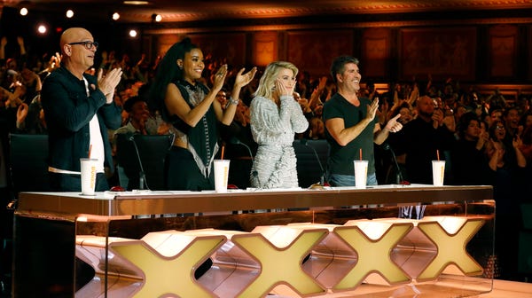 Returning "America's Got Talent" judges Howie...