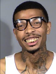 Las Vegas Police arrested Quinn Hasean Wednesday after he allegedly fired a weapon at the Fashion Show Mall on the Las Vegas Strip.
