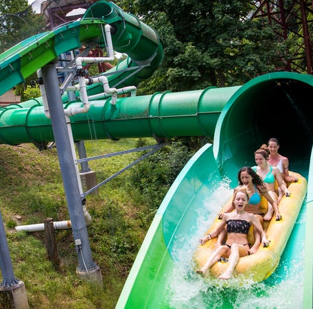 Guests enjoy the RiverRush watercoaster at Dollywood's Splash Country on Thursday, May 30, 2019. 