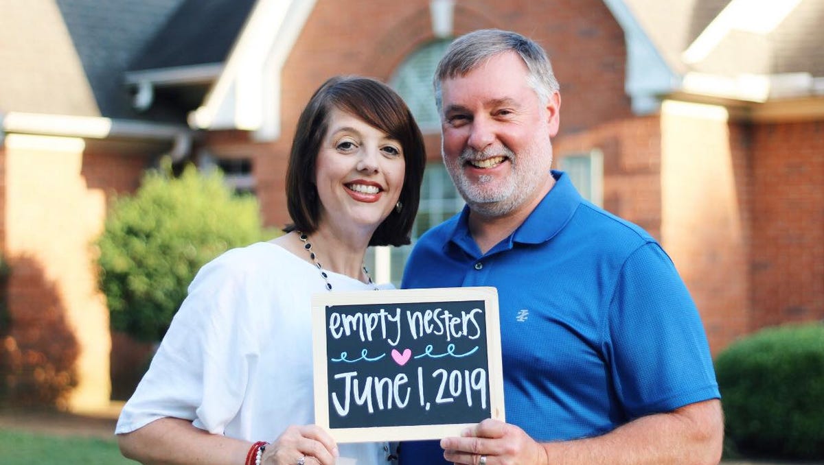 Amy and Randy English have an empty nesters themed photo shoot after their last kid moves out of the house.
