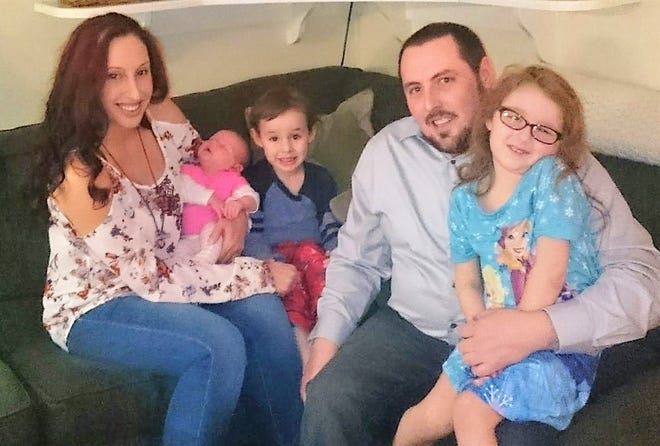 The Belongia family of Oconto is hosting a run/walk on July 13 to benefit local agencies that rescued their son after he suffered a life-threatening illness a year ago. In a photo taken before Lincoln, center, was stricken, from left are Angelina, Emerson (now 16 months), Lincoln (now 4), Keith and Sloan (now 6).