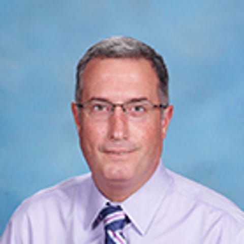 Former Principal Michael Comeau