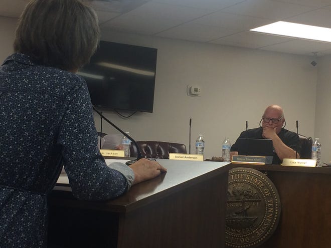 Gina BInkley of the Braxton Lee Homestead Foundation addresses Ashland City Mayor Steve Allen and the Ashland City Council at its special-called meeting Thursday, May 30.