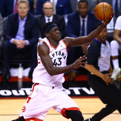 Pascal Siakam drives to the bucket for two of his...