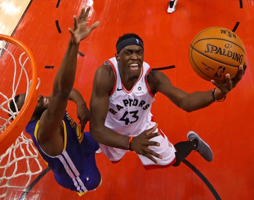 Game 1: Raptors forward Pascal Siakam (43) drives to the bucket against Warriors defender Draymond Green (23) during the second half.
