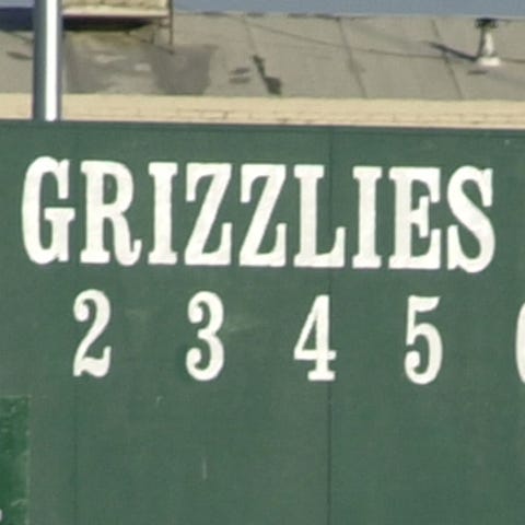 Hand operated scoreboard at Grizzlies Stadium in...