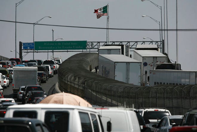 Trucks line up at the Cordova - Las Americas international bridge to cross with their cargo from Mexico into the United States, in Ciudad Juarez, Mexico, Friday, May 31, 2019. President AndrÃs Manuel LÃ³pez Obrador said Friday that Mexico won't panic over U.S. President Donald Trump's threat of coercive tariffs, measures that economists say could have dramatic consequences for both nations and potentially spur a full-blown trade war.