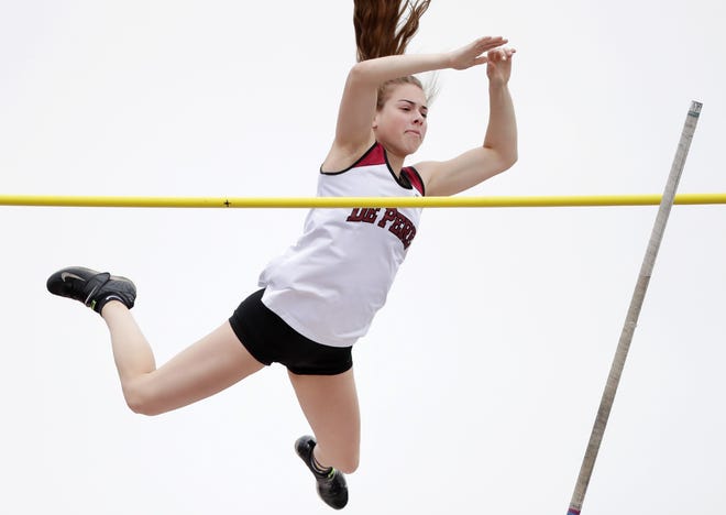 De Pere's Olivia Fabry clears the bar during the Division 1 pole vault at the WIAA state track and field meet Saturday at Veterans Memorial Field Sports Complex in La Crosse.