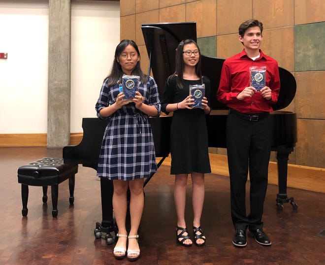 Students receiving Farrell Festival Sonata Plaques were Jane Kim, Alayna Kang and Nathen Miller.