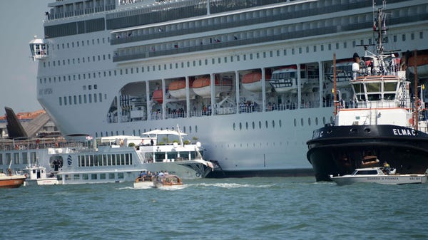 Cruise ship collides with tourist river boat in...