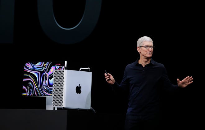 Apple CEO Tim Cook speaks about the MacBook Pro at the Apple Worldwide Developers Conference in San Jose, Calif., Monday, June 3, 2019.