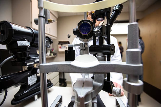 A piece of equipment used for an eye exam is shown in this file photo from May 31, 2019. A new report suggests that nearly 40 percent of Americans have myopia, up 25 percent from just 40 years ago, according to the American Optometric Association.