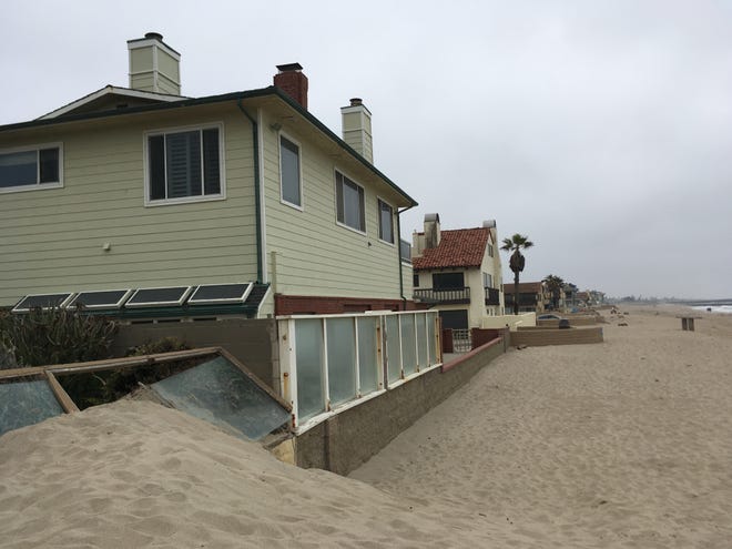 Looking from the beach toward Norwich Lane, sand builds up. The property owner at the end of Norwich pays to have the city of Ventura clear the sand in front of his property, but the one at the end of Brunswick Lane does not. Whether a property does or doesn't is related a settlement agreement reached between the city and property owners in 2011.