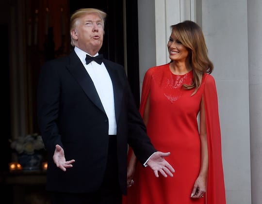President Donald Trump and first lady Melania Trump ahead of a dinner at Winfield House for Prince Charles and Camilla, Duchess of Cornwall.
