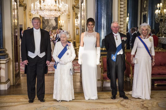 President Donald Trump, Queen Elizabeth II, first lady Melania Trump, Prince Charles and his wife, Camilla Duchess of Cornwall, pose before a state banquet at Buckingham Palace on June 3, 2019.