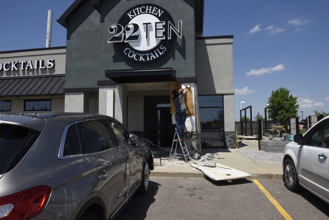 A car collided with the entrance of 22Ten Kitchen Cocktails on 69th Street on Wednesday around 1 p.m.