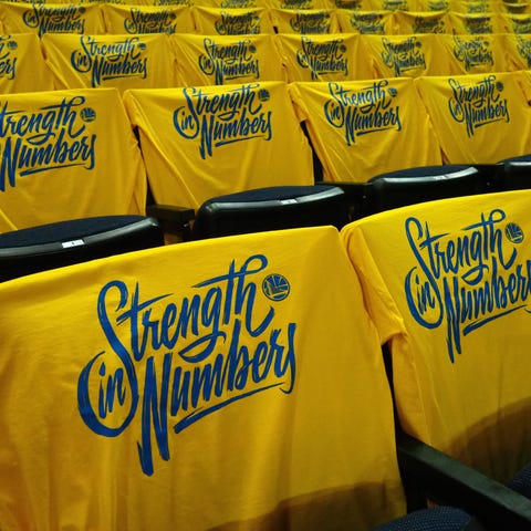 "Strength in Numbers" shirts the Warriors gave...