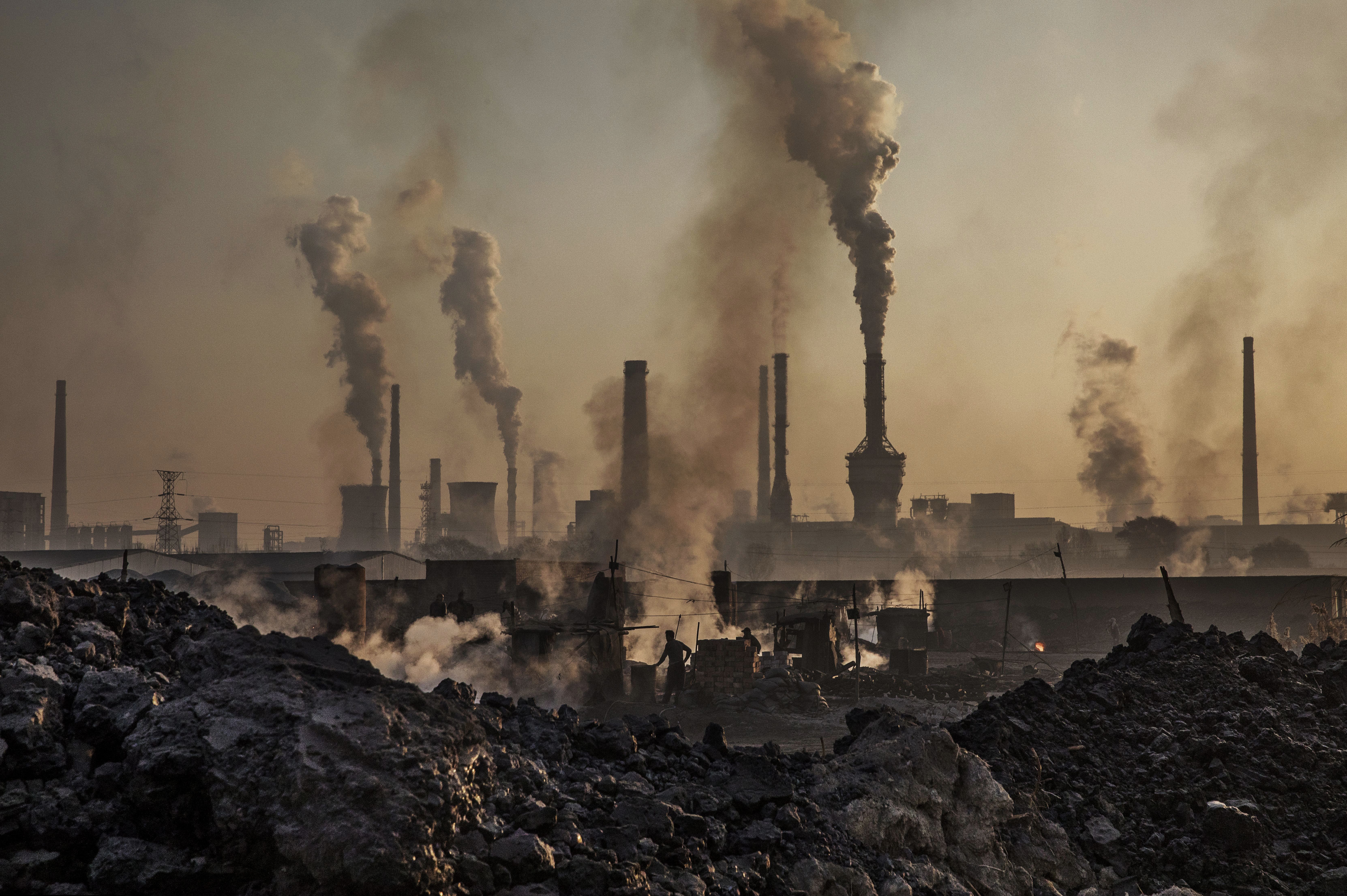 Smoke billows from a large steel plant on November 4, 2016 in Inner Mongolia, China. Over the industrial era, the amount of carbon dioxide in the atmosphere has increased by about 40%, according to the U.S. Global Change Research Program.