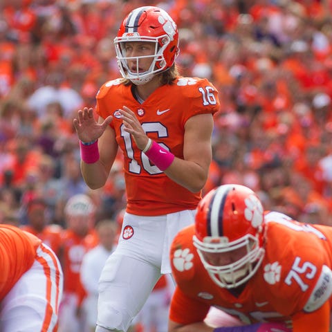 Clemson quarterback Trevor Lawrence prepares to ta