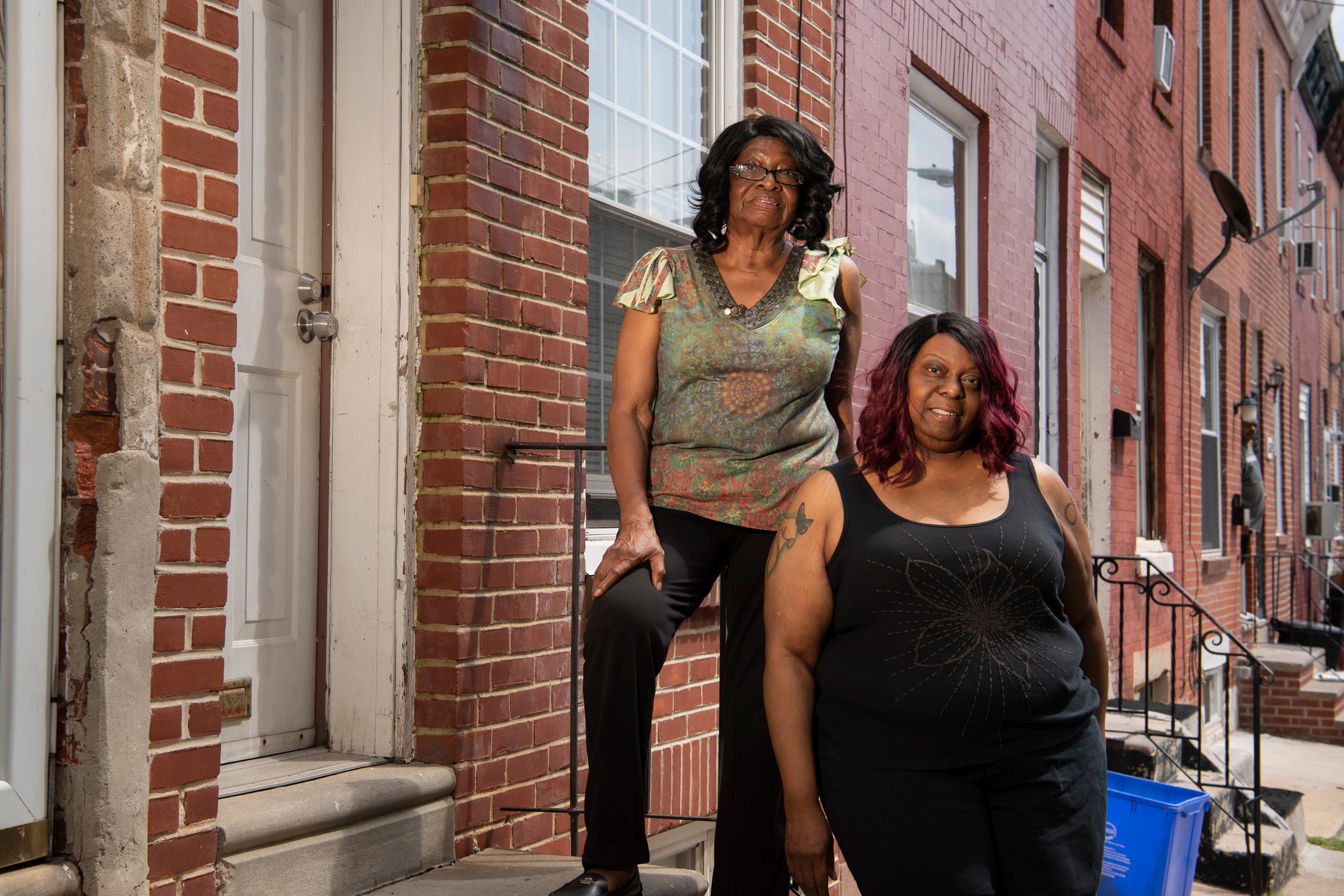 Monique Sharp, left, says she suspects lenders targeted the neighborhood where her mother, Phyllis, lives because home values were rising.