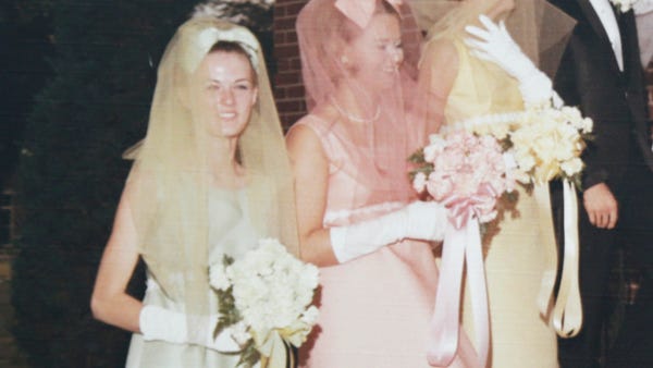 Mary Silvani, far left, is a bridesmaid for...