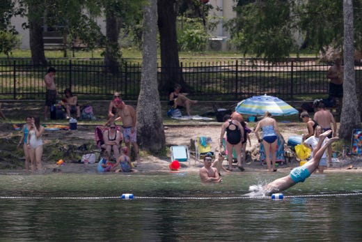 When temperatures rise, visitors flock to Wakulla Springs State Park to cool off in the shade on the beach and take a dip in the water. 