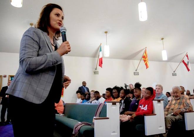 Gov. Gretchen Whitmer addresses residents of Benton Harbor at a special community meeting on June 5  to discuss the state's proposal to close the high school.