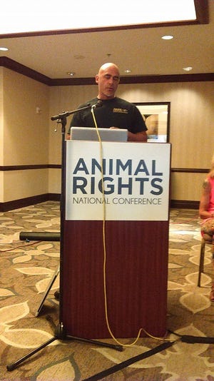Richard Couto, founder of the Animal Recovery Mission, speaking about animal rights. Couto started the group to be an "uncompromising defending force" for animal welfare, often doing undercover investigations to find animal cruelty.