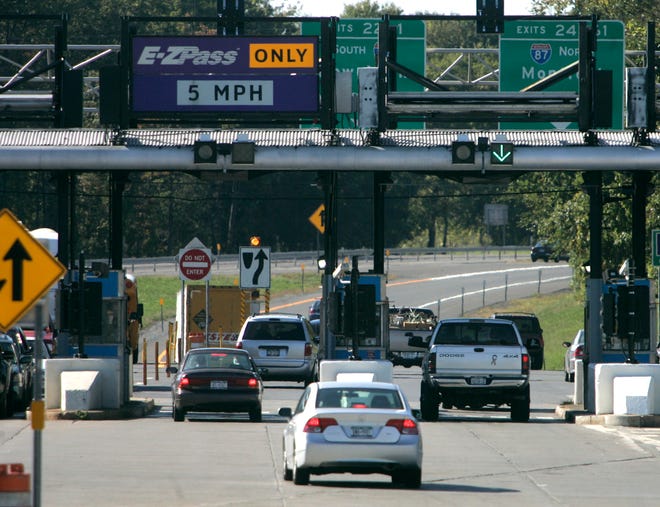 Vehicles enter the New York State Thruway in Albany, N.Y.