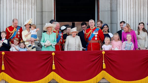 Britain's Queen Elizabeth, center, and members of...