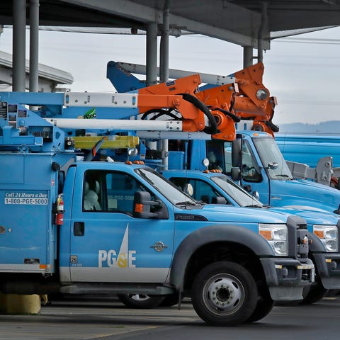 Pacific Gas & Electric vehicles are pictured parke