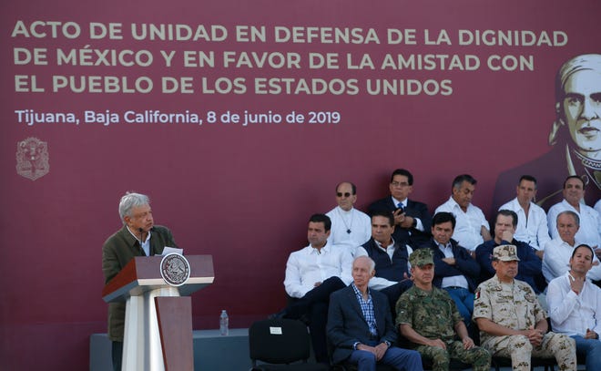 Mexican President Andres Manuel Lopez Obrador speaks during a rally in Tijuana, Mexico, Saturday. The event was originally scheduled as an act of solidarity in the face of President Donald Trump's threat to impose a 5% tariff on Mexican imports if it did not stem the flow of Central American migrants heading toward the U.S