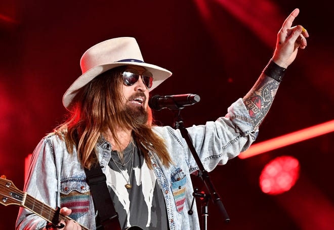 Billy Ray Cyrus performs with Lil Nas X and Keith Urban during the 2019 CMA Fest Saturday, June 8, 2019, at Nissan Stadium in Nashville, Tenn.  